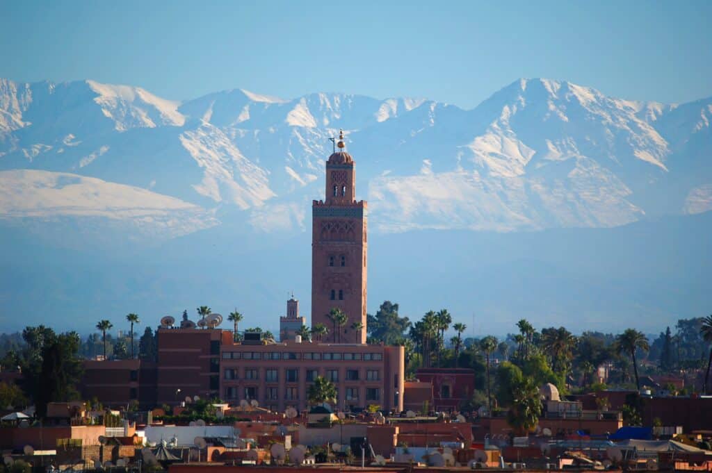 koutoubia mosque and snow capped mountains