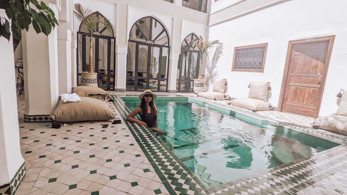 girl in riad pool marrakech