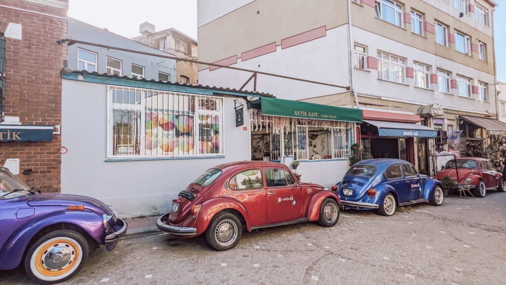 quirky street with old cars in Balat