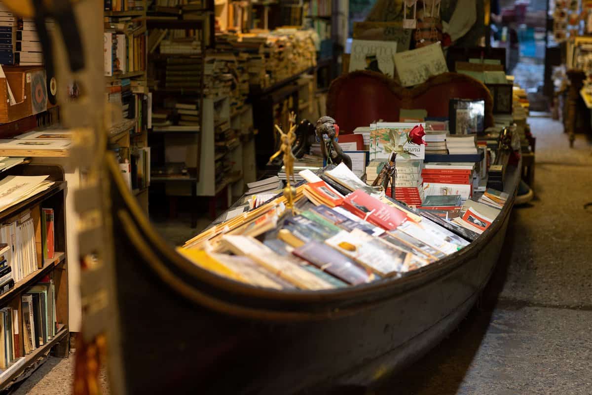 Libreria Acqua Alta: Although no longer a hidden gem since becoming insta famous, Libreria Acqua Alta is still a worth a visit. Located in the heart of Venice, this is a book lover's paradise like no other. The unique bookstore is known for its whimsical and charming arrangement of books, which are often stacked in gondolas, bathtubs, and even a full-sized gondola positioned inside the shop. The name, "Acqua Alta," translates to "high water," reflecting the fact that the store is well-prepared for Venice's occasional flooding with books stored in waterproof containers. With an eclectic collection of both new and second-hand books, Libreria Acqua Alta offers visitors a delightful and quirky literary experience amidst the enchanting backdrop of Venice's canals. 