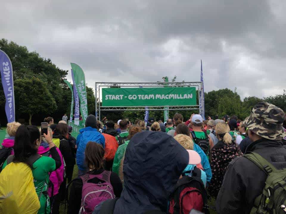 lots of people preparing to take place in the jurassic coast mighty hike