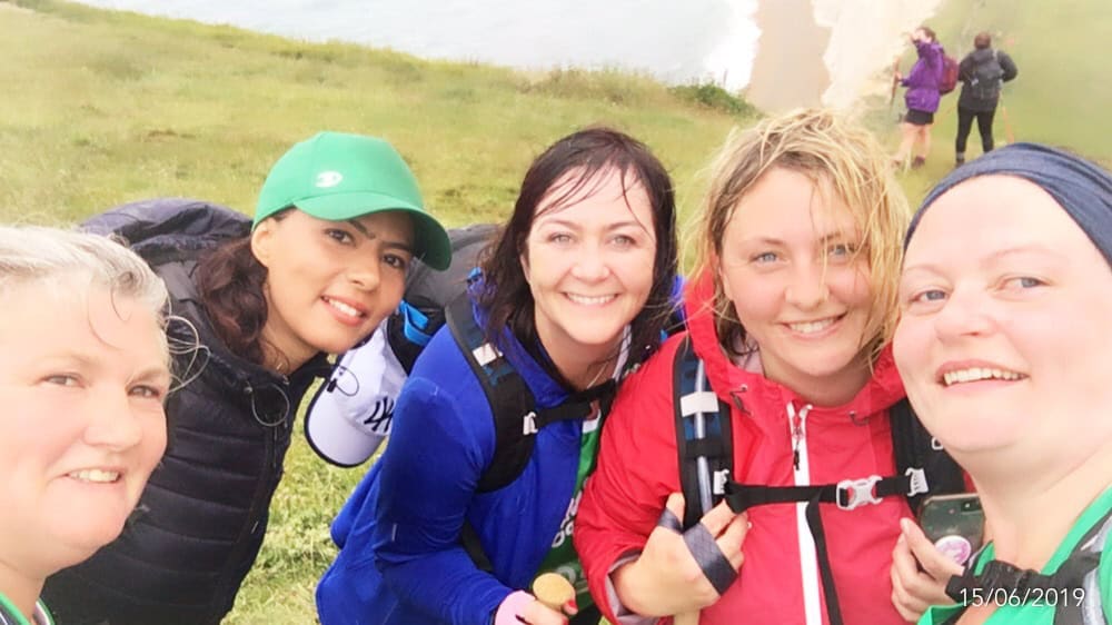 A group of women smiling at the camera