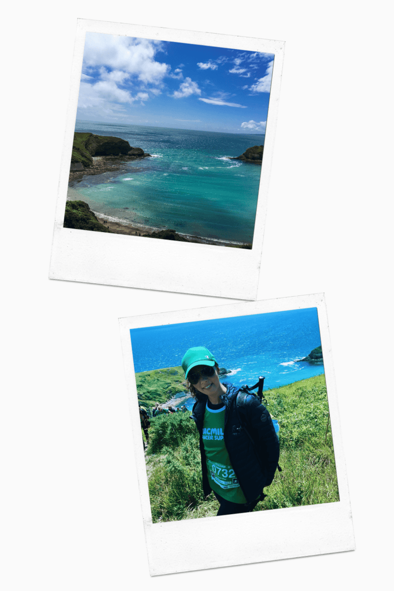 Girl standing on a hill with beautiful views of emerald green water 