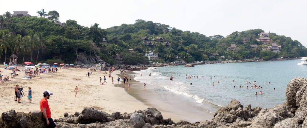Rocks and jungle in Playa Los Muertos Sayulita